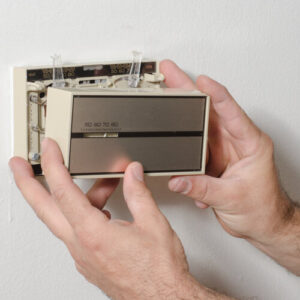 Removing an old Thermostat Cover
