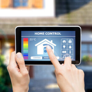 person using smart phone app to control home HVAC unit